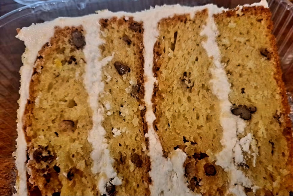 A slice of Italian Cream cake from Twisted Whisk