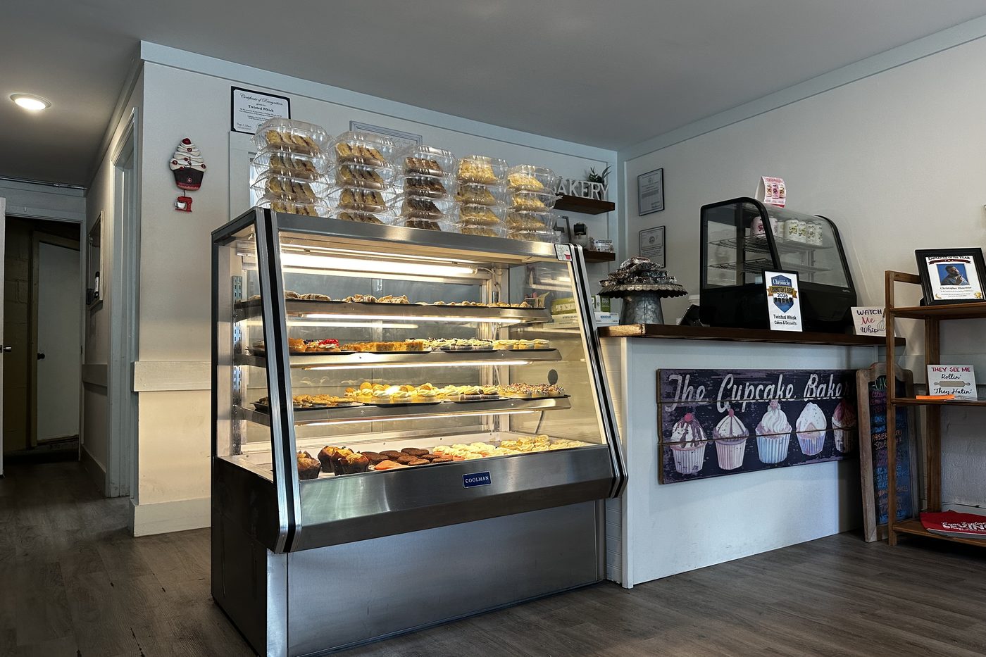 The bakery counter and cupcake bar inside Twisted Whisk