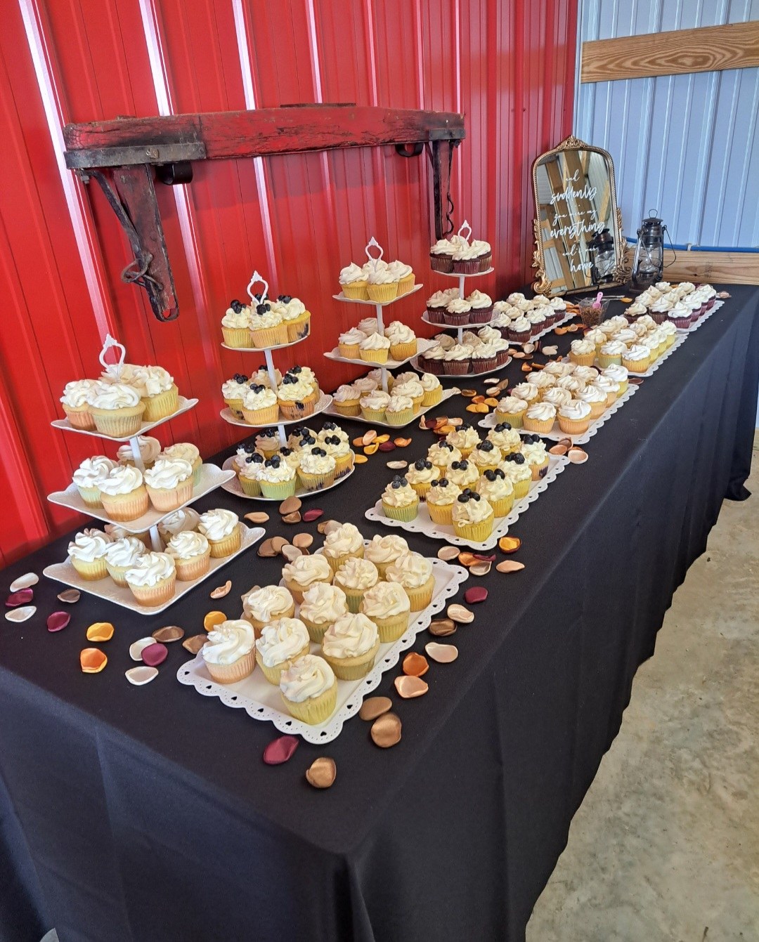 A Twisted Whisk dessert table filled with cupcakes for a special event