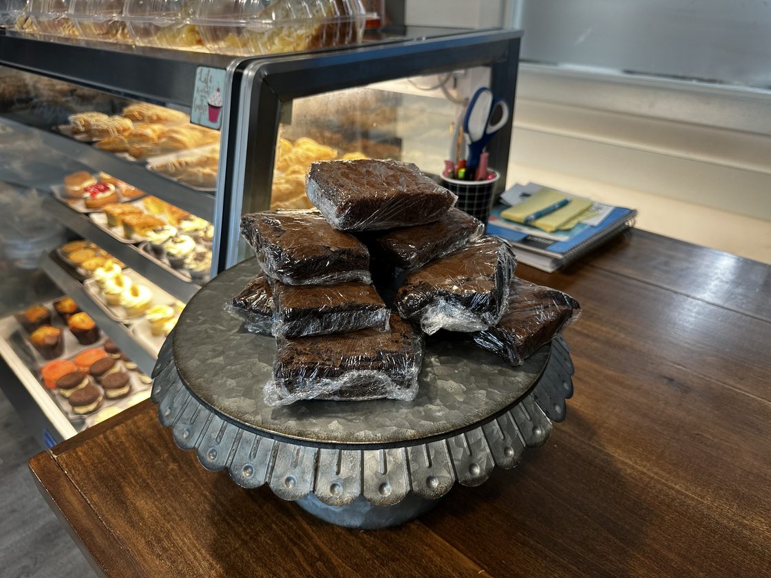 A stand of freshly wrapped brownies on the Twisted Whisk counter